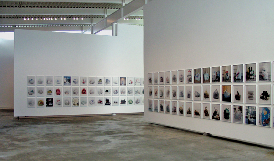 Kelly Wood's photography hangs on the ingenious pivoting walls of the gallery. Peter Cardew Architects