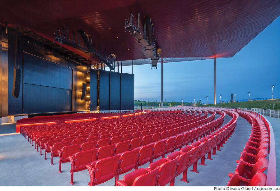 The amphitheatre includes 3,500 fixed seats, with room for spillover audiences on a grassy slope beyond.