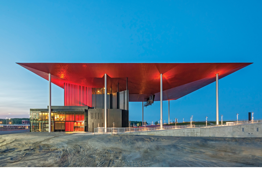Supported atop eight slender columns, the roof tapers to a mere 25 mm thickness at its edges.