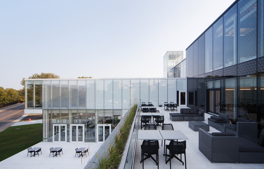 An upper terrace extends an interior lounge space, and adjoins both the permanent exhibition galleries and a group reception room.