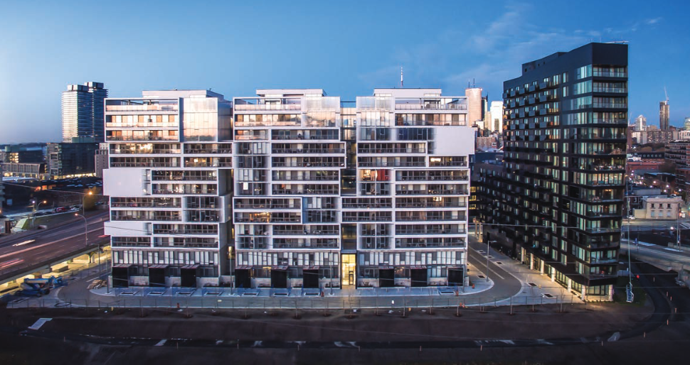 A playful façade composition gives individual identity to the condomiumum units in the white Phase 2 building